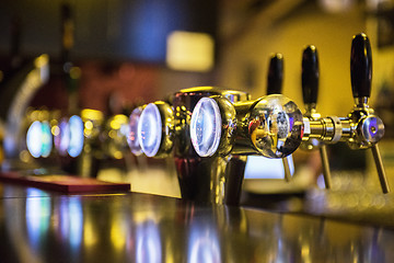 Image showing Metallic beer taps