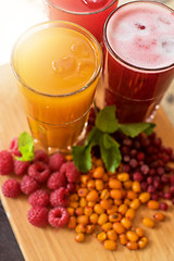 Image showing fruit drink with cranberries raspberries and sea buckthorn