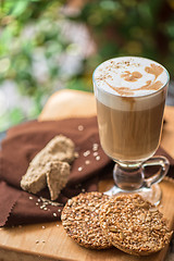 Image showing coffee latte cup with cookies