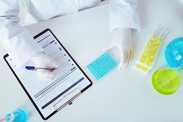 Image showing close up of scientist making test in lab