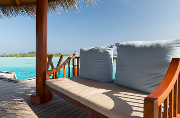 Image showing patio or terrace with canopy and bench on beach