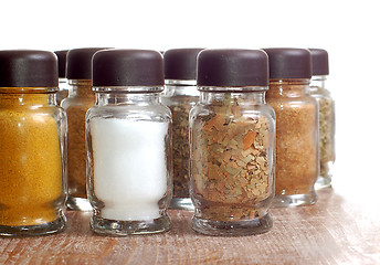 Image showing variety of spices in bottles