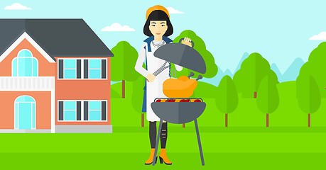 Image showing Woman preparing barbecue.