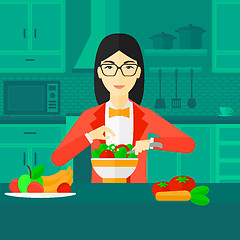 Image showing Woman cooking meal.