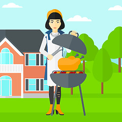 Image showing Woman preparing barbecue.