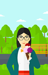 Image showing Woman holding icecream.