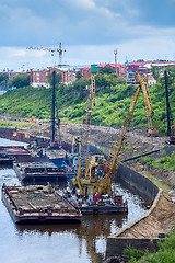 Image showing Floating cranes and pile driving machine on barge