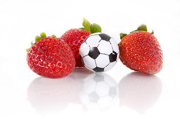 Image showing Strawberries and soccer ball