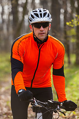 Image showing Mountain Bike cyclist riding single track