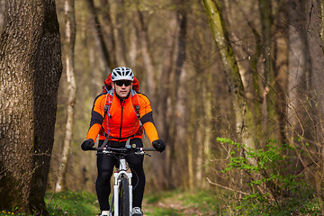 Image showing Mountain Bike cyclist riding single track