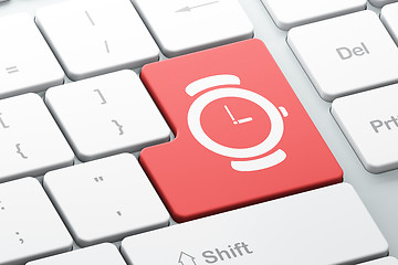 Image showing Time concept: Watch on computer keyboard background