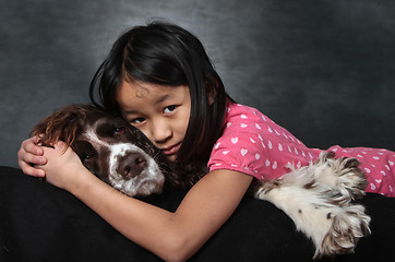 Image showing Child and dog