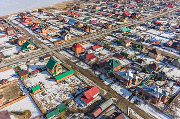 Image showing Aerial view on suburban street at spring