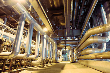 Image showing Equipment, cables and piping as found inside of a modern industr