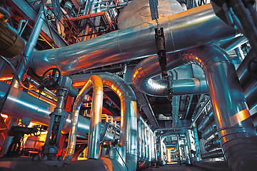 Image showing Equipment, cables and piping as found inside of a modern industr