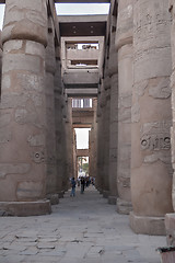 Image showing Tourist between Karnak Columns. Luxor, Egypt