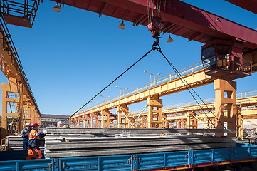 Image showing Loading concrete products in onboard car