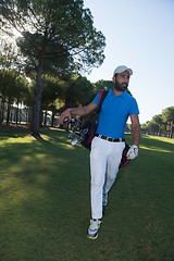 Image showing golf player walking