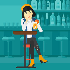 Image showing Woman sitting at bar.