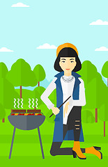 Image showing Woman preparing barbecue.