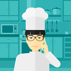 Image showing Chef pointing forefinger up.