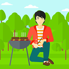 Image showing Man preparing barbecue.