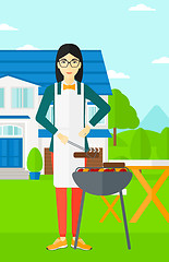 Image showing Woman preparing barbecue.