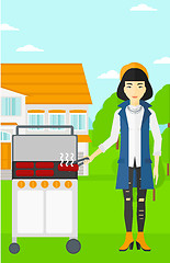 Image showing Woman preparing barbecue.