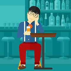 Image showing Man sitting at bar.