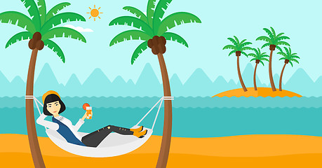 Image showing Woman chilling in hammock.