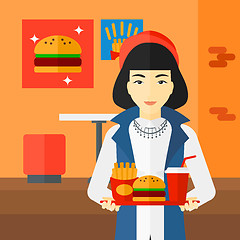 Image showing Woman with fast food.