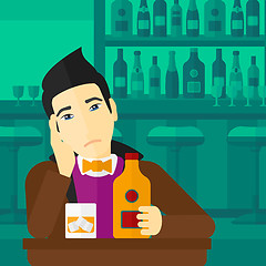 Image showing Sad man with bottle and glass.