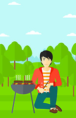 Image showing Man preparing barbecue.