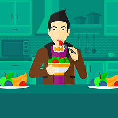 Image showing Man eating salad.