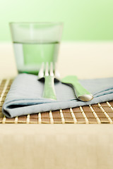 Image showing Napkin on and the fork and spoon