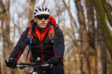 Image showing Mountain Bike cyclist riding single track