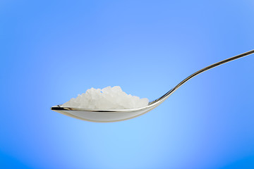 Image showing Spoon filled with sea salt