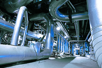 Image showing Equipment, cables and piping as found inside of a modern industr