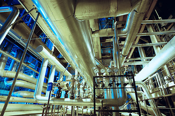 Image showing Equipment, cables and piping as found inside of a modern industr