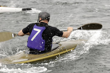 Image showing Man in kayak race