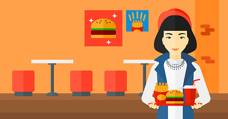 Image showing Woman with fast food.