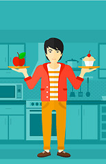 Image showing Man with apple and cake.
