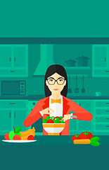 Image showing Woman cooking meal.