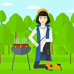 Image showing Woman preparing barbecue.