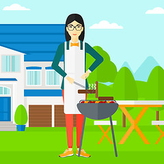 Image showing Woman preparing barbecue.