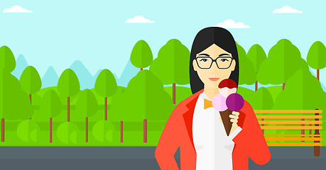 Image showing Woman holding icecream.