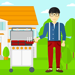 Image showing Man preparing barbecue.