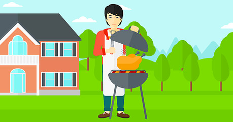 Image showing Man preparing barbecue.