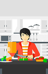 Image showing Man cooking meal.