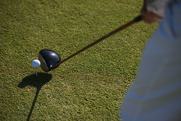 Image showing top view of golf club and ball in grass